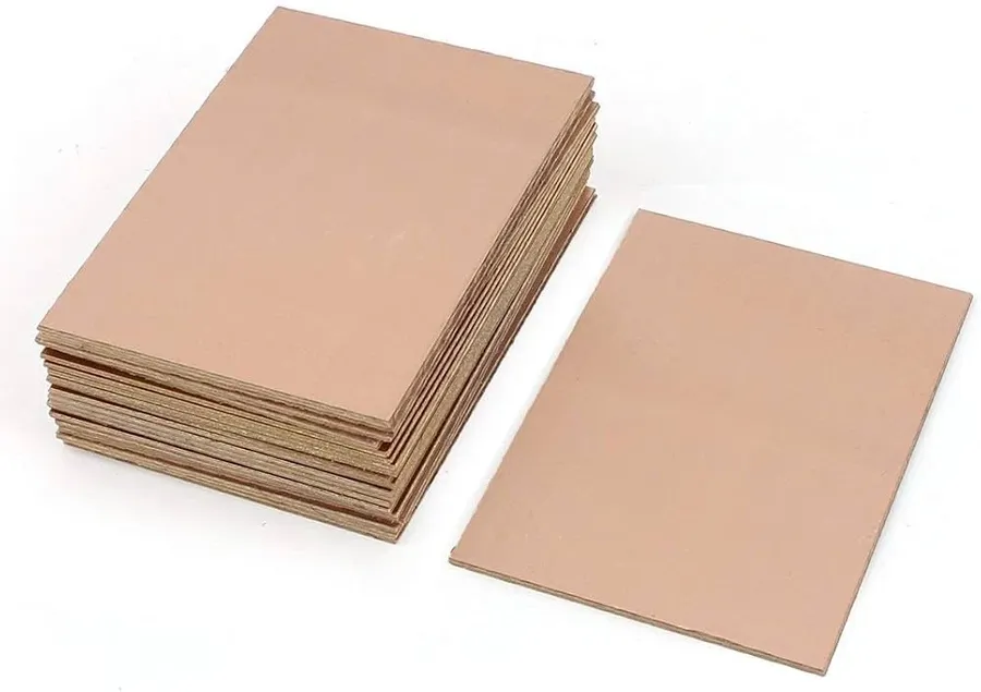 A sheet of FR4 material, which is a common substrate for PCBs.