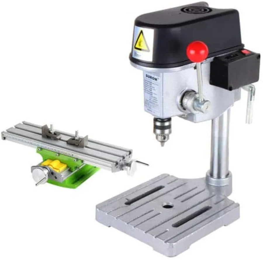A machine drilling holes on a circuit board.
