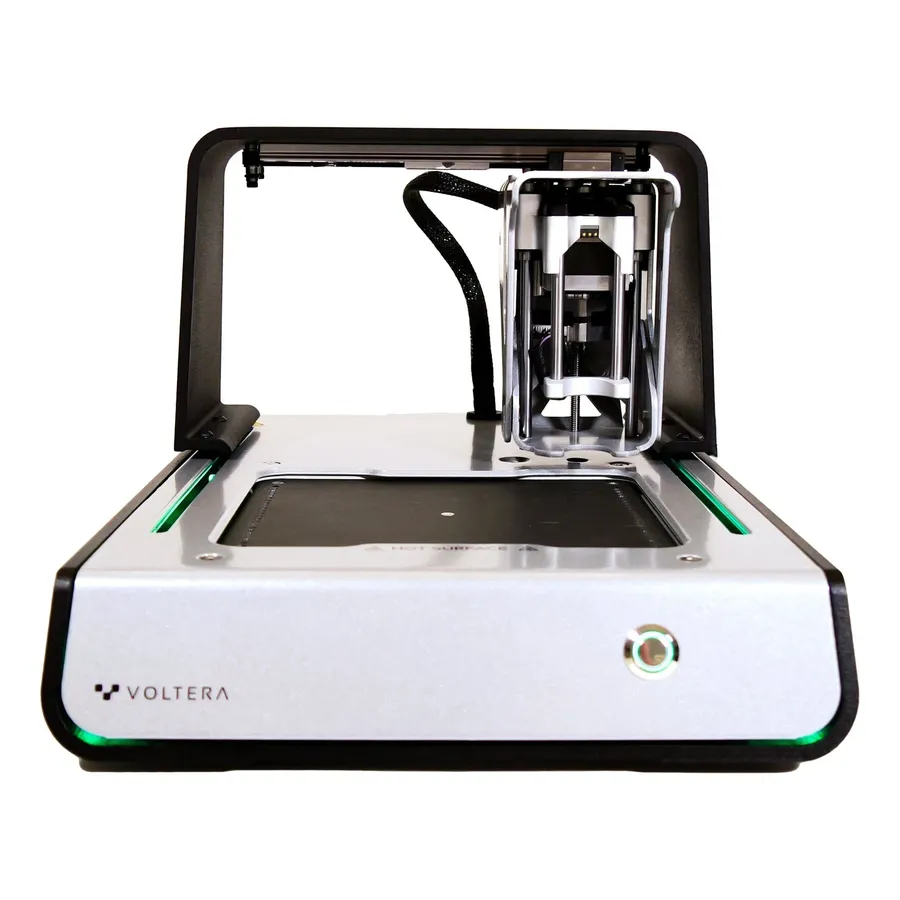 A close-up view of the Voltera V-One printing a circuit board.