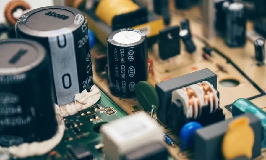 Capacitors mounted on a circuit board.