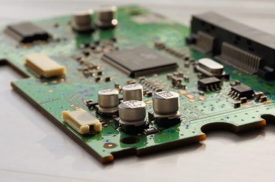 A variety of electronic components, including resistors, displayed in a selection process.