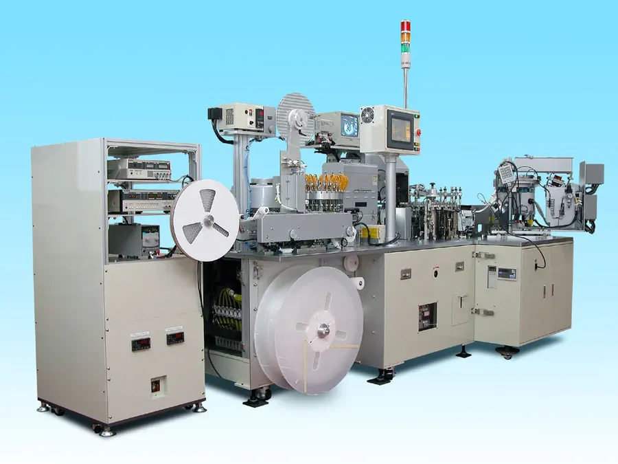 A view of a capacitor production line in a factory.