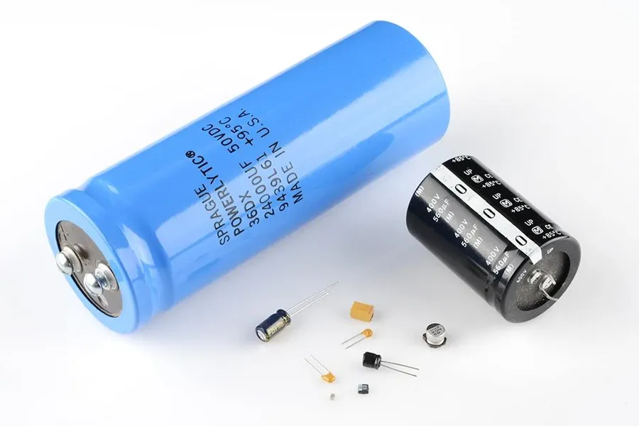 Side-by-side comparison of a large and small capacitor.